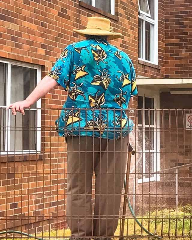 You have to admire the commitment to watering the lawn to have your own watering shirt. Do you think he has a lawn mowing shirt?