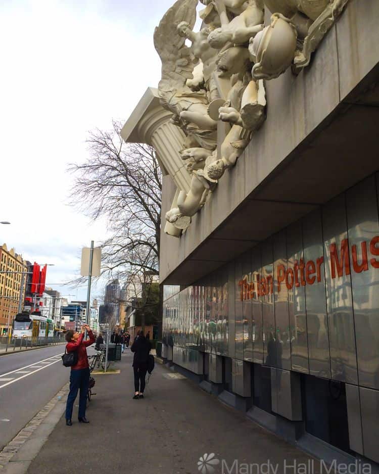 Photographing the sculpture outside the Ian Potter gallery at Melbourne Uni