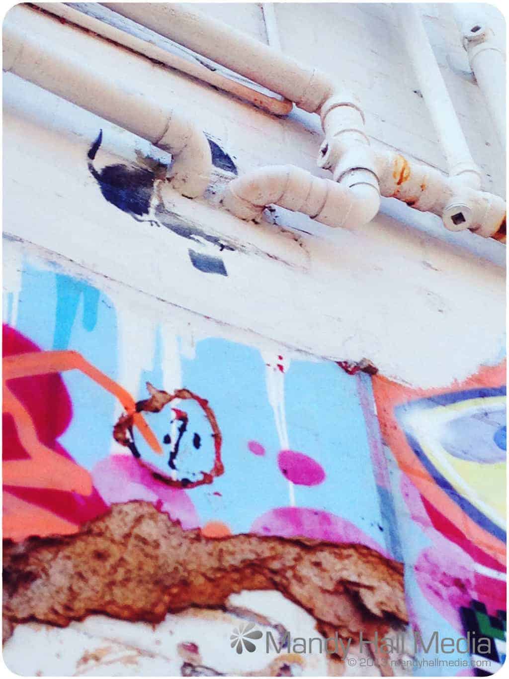 This used to be a Banksy. Poor little rat.
