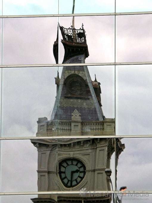 Dandenong town hall reflected in the building across the road