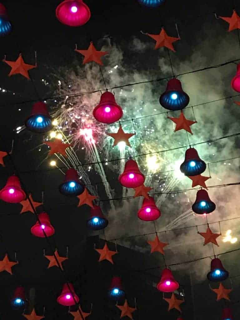 New Years fireworks through the Christmas decorations
