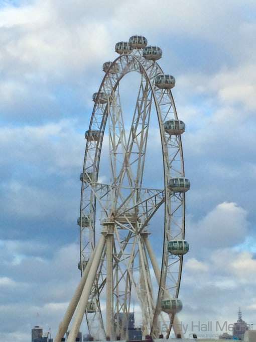 The big wheel in Dockloand, Melbourne. People inside enjoying the gloomy view.