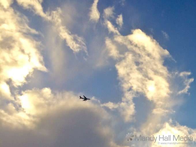 Plane in the sky on a sunny morning