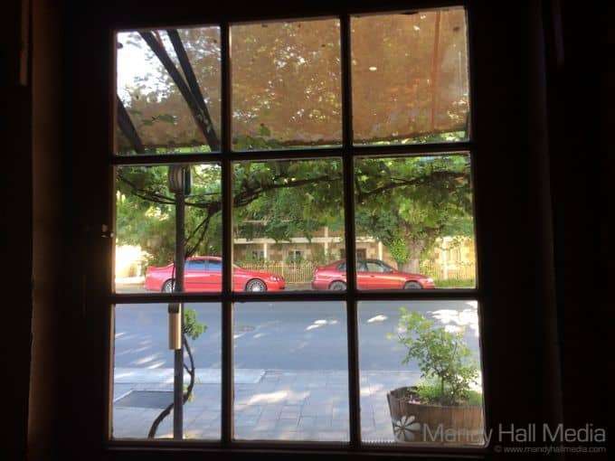 Red cars across the road