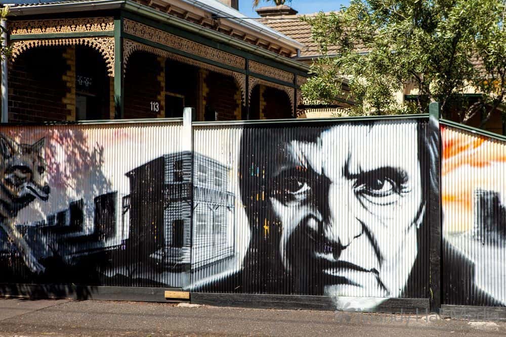 Close up of Johnny Cash on the fence