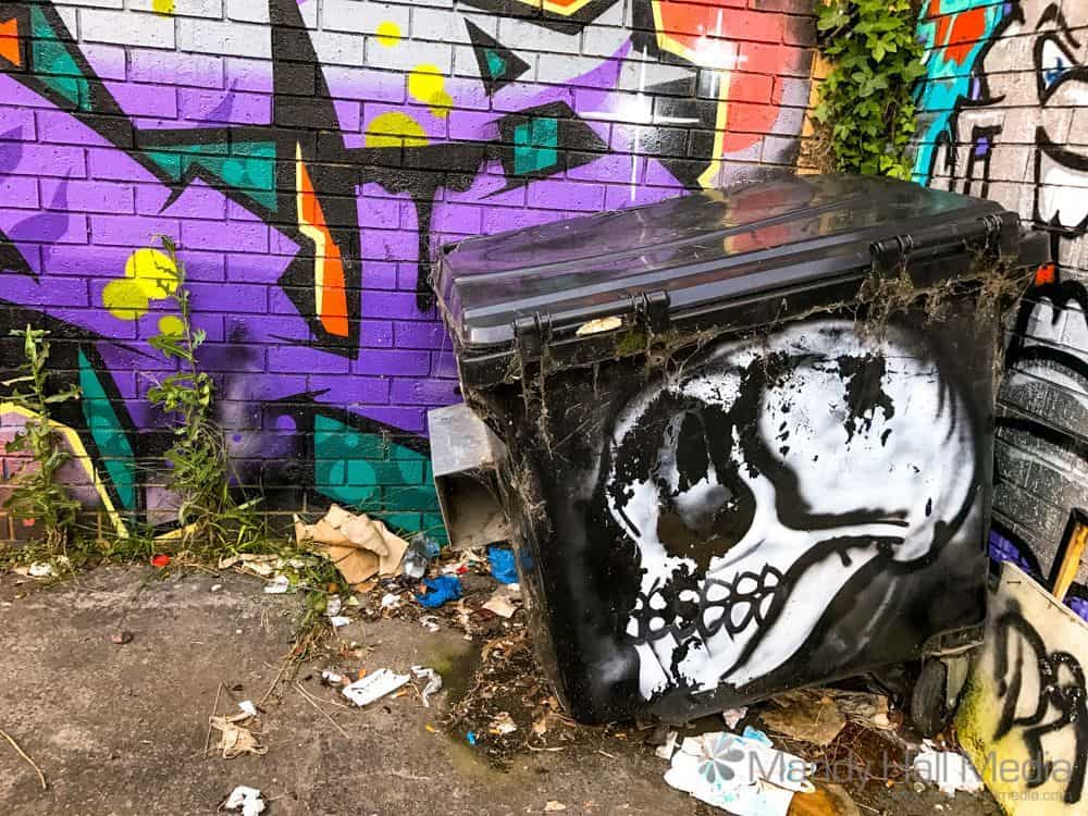 Skull dumpster bin