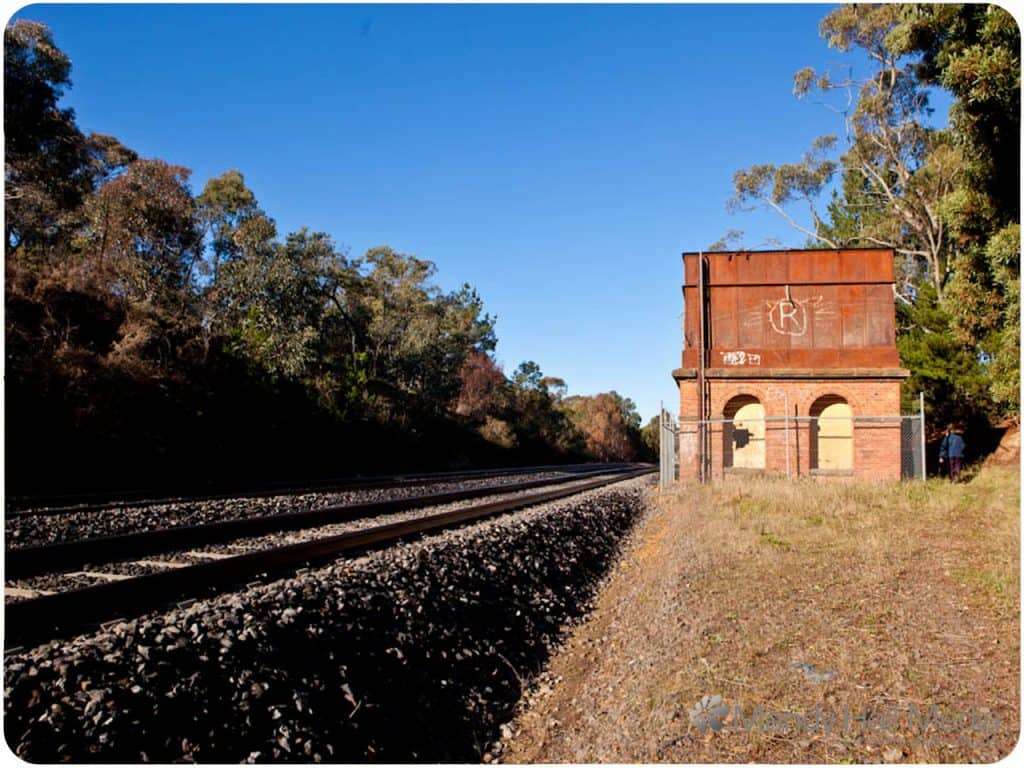 Old water tower on the train tracks