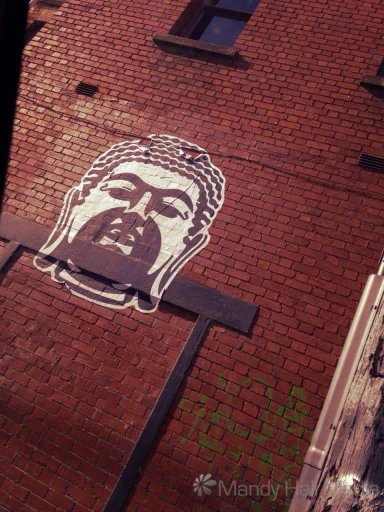 Buddha paste up in laneway in South Yarra
