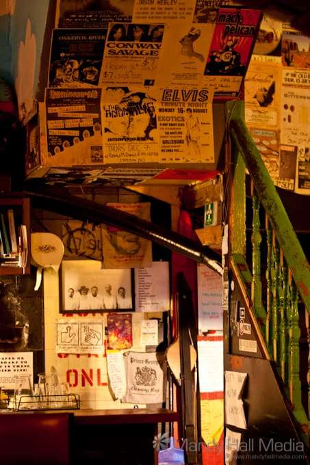 Ephemera in the Old Bar in Fitzroy. Elvis behind the bar and his lookalike sitting at the bar.
