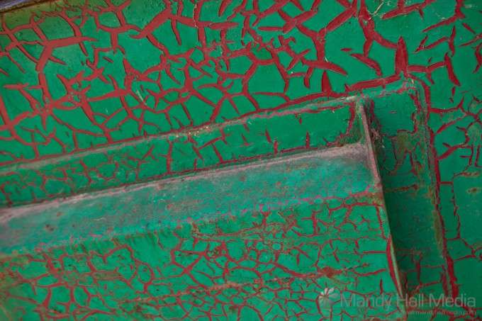 Old, cracked dumpster