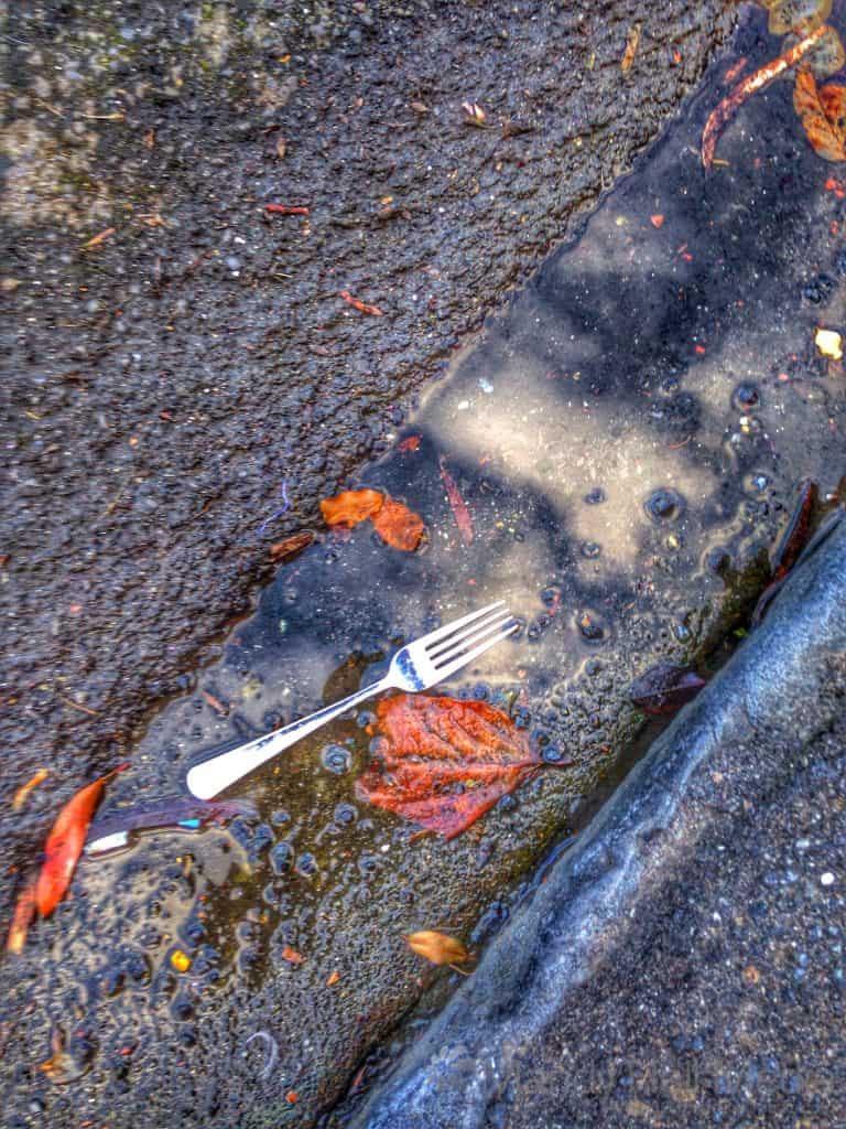 Abandoned fork in the gutter