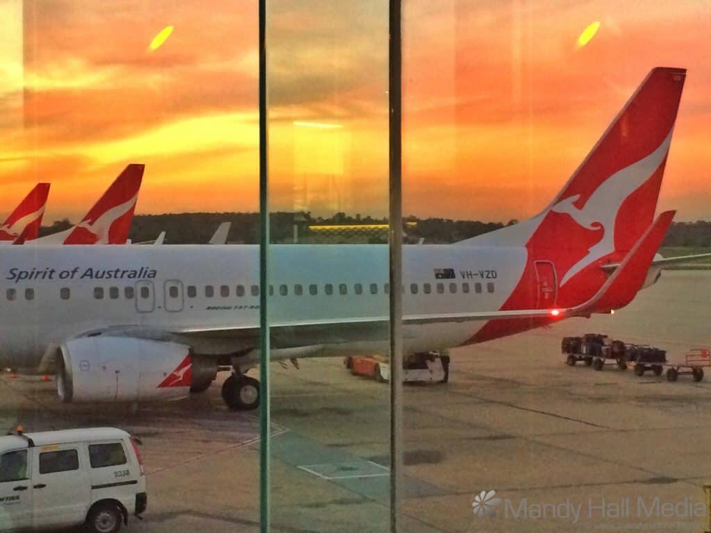 Sunset over Qantas planes at Melbourne airport
