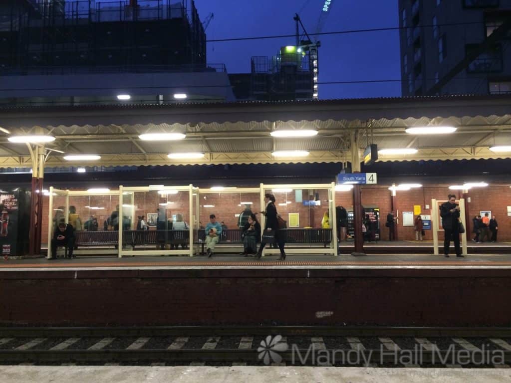 Waiting for the train at dusk