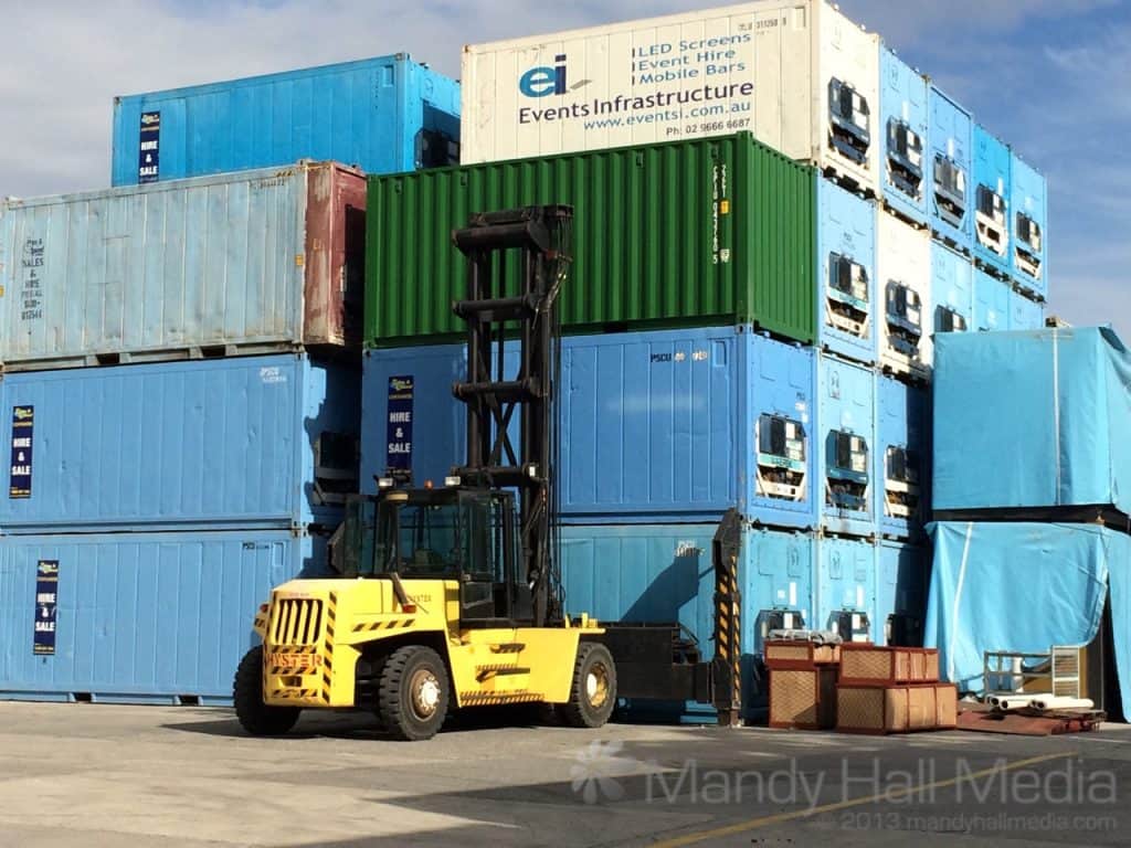 Shipping containers and giant forklift