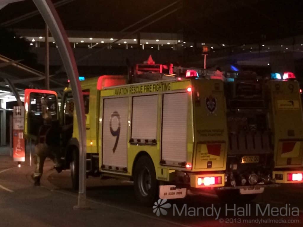 Firemen at the airport. Very casually arrived 5 minutes after the alarm was turned off and wandered around for a bit.