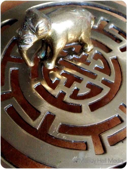 Elephant meditating on a mandala