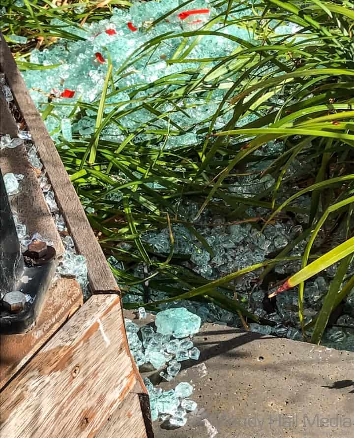 Broken glass in the garden – looks like ice